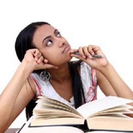 Image Showing A Girl Thinking About Concentration While Studying.