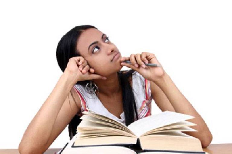 Image Showing A Girl Thinking About Concentration While Studying.