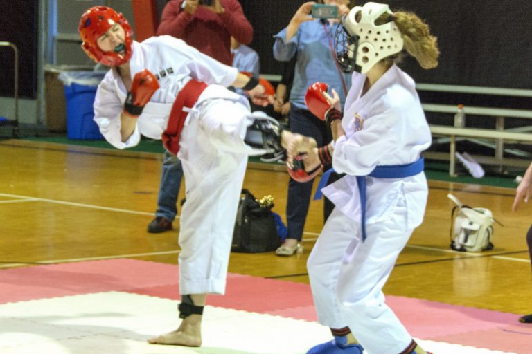 Image Showing Two Girls In Action During A Training Session.