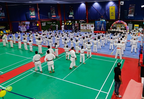 Mass Number Of Karate Athelets Practicing In The Stadium.