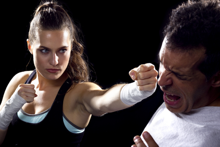 Young Fit Woman Fighting With A Man.