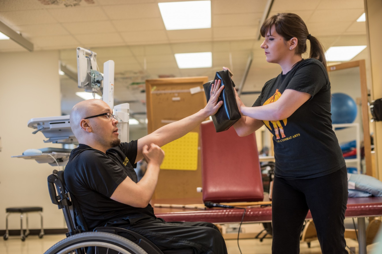 A Wheelchair User Trying To Defend His Trainer.