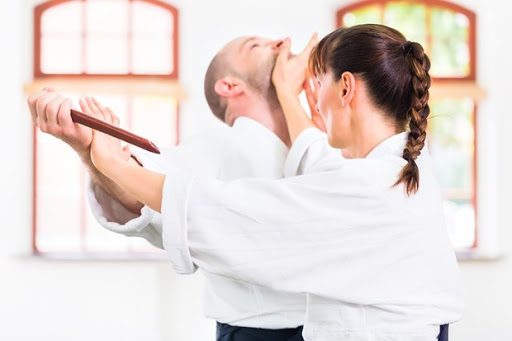 A Woman Beat A Man In Her Martial Arts Training Session.