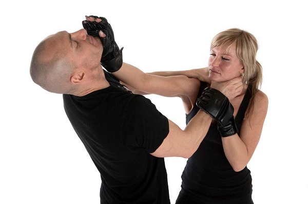 Woman Self Defense Training With Her Trainer.