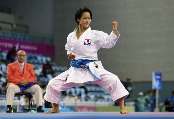 A Female Karate Fighter In A Tournament.